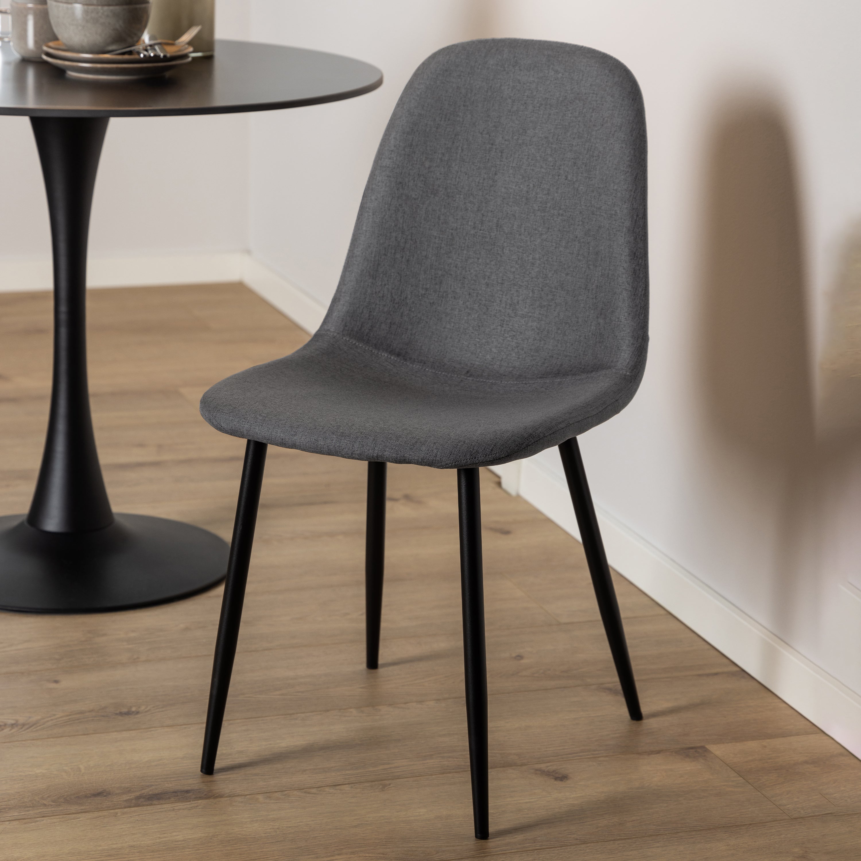 Malta Ceramic Round Dining Table in Black 90cm includes 4 Celia Dining Chairs in Light Grey